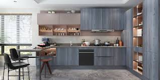 Our favorite part of this modern kitchen design is the large center island, complete with minimalist custom wood bar stool seating.this kitchen demonstrates the playfulness of scandinavian design—you don't have to. L Shaped Wood Grain Melamine Kitchen Cabinet Plcc20075