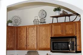 We started off 2012 here at old town home with a public proclamation of numerous new year's resolutions. Decorating Above The Kitchen Cabinets Decor To Adore