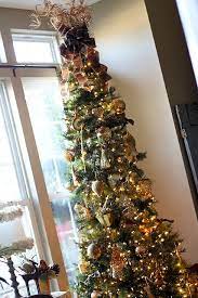 Holiday Home Tour On Scissors Spatulas One Of My Favorite Blogs Skinny Christmas Tree Slim Christmas Tree Elegant Christmas Trees Slim and pencil christmas trees, on the other hand, have a slender shape and are more suitable for rooms with limited space. skinny christmas tree