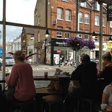 A look at iconic london street the kings road chelsea on the way from sloane square to the stockpot restaurant for a full english breakfast. Starbucks 123a Kings Road