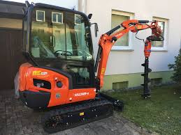 Baumaschinen & zubehör » bagger » kubota. Kubota Mini Bagger Mit Erdbohrer Fahrzeuge Traktoren Bagger