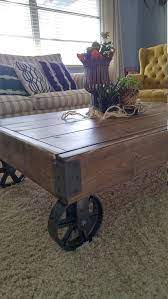 Our solid wood industrial modern coffee table with iron wheels gives that idea a shape. Factory Cart Industrial Coffee Table Factory Cart Coffee Etsy Rustic Coffee Tables Rustic Wooden Coffee Table Coffee Table Farmhouse