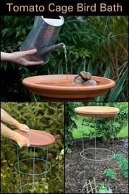Bird Bath For Inside Cage Tomato Cage Bird Bath In 2020 With Images Bird Bath Garden Diy Bird Bath Diy Garden Projects