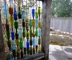 Using cobalt glass in the garden. How To Build A Wall From Recycled Bottles Wine Bottle Wall Bottle Wall Patio Wall Art