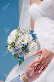 White fresh flower wedding bouquets. Hands With Wedding Rings And Beautiful Blue And White Fresh Flowers Wedding Bouquet Stock Photo Picture And Royalty Free Image Image 35393406