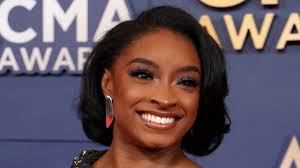 Simone Biles debuts new look as she wows at CMAs but NFL husband Jonathan  Owens is nowhere to be seen