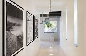Find Out Some Great Narrow Hallway Decorating Ideas For Achieving An Attractive Functional And Stylis Narrow Hallway Decorating Hallway Designs Modern Hallway