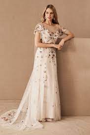Trending Now The Embroidered Wedding Dress These Colorful Floral Gowns Are Turning Heads Green Wedding Shoes Embroidered Wedding Dress Wedding Dress Trends Bhldn Wedding Dress