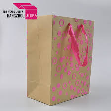 The vogue sized paper bag is 16x6x13 and is the iconic bag design for clothing stores and fashion related businesses. China Custom Cheap Clothing Packaging Bag And Gift Bags With Handles China Paper Clothing Bag And Garment Packing Bag Price