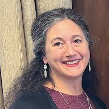 What do you get when you complete a page in Maggie's collection book?