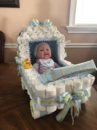 Elegant Stroller Made Of Diapers A Baby Shower Centerpiece Or A Precious Gift Baby Shower Centerpieces Boy Baby Shower Centerpieces Trendy Baby Shower Ideas