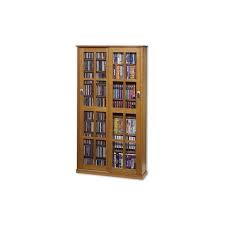 At one way furniture you'll find designs as unique as your taste in entertainment, with dramatic spinning towers, sliding glass doors, and wall mounted options all available. Leslie Dame 62 Cd Dvd Wall Media Cabinet In Oak Ms 700