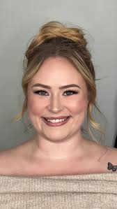 Did you know, the editing style of your photographer's photos can change  the way your makeup looks in photographs? To put it simply.. Photos that  are darker and more moody will make