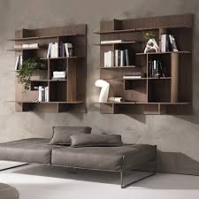 This wall shelving stands nearby the glass wall that will give it a lot of lights during the day. Manisa Maze Designer Wall Units Robson Furniture