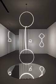 Midway Between A Light Sculpture And An Industrial Design Object Arrangements Is Conceived As Pure Geometric Lights Th Lamp Design Mirror Interior Design Flos