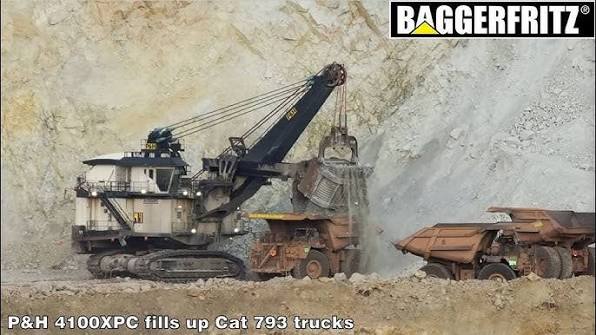 MASSIVE P&H 4100XPC shovel loads a fleet of Cat 793 trucks at Morenci copper mine - YouTube