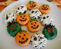 Why bring boring old cookies to the halloween party when you can make these awesome oreo halloween cookie ideas! Halloween Cookies Dipped And Decorated Oreos Halloween Cookies Monster Cookies Halloween Recipes