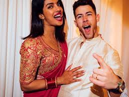 Nick jonas, 26, and priyanka chopra's, 36, first official wedding photos have been unveiled, showing the happy couple priyanka chopra stuns in a red lehenga and white ralph lauren gown decorated with two million pearl sequins and a 75ft veil as she and nick jonas unveil first official shots. Priyanka Chopra And Nick Jonas 1 Year On 12 Reasons They Are Couplegoals Hollywood Gulf News
