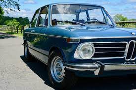 1973 Bmw 2002 Tii Finished In Riviera Blue With Saddle Interior Hunting Ridge Motors Bmw 2002 Bmw Vintage Bmw 2002 Tii