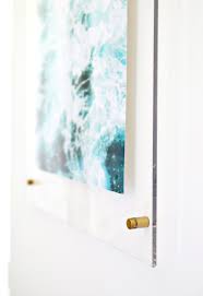 Before you put the glass back in your frame, attach the picture hanger to if, your frame allows you, use the original nails to secure the glass in place. Floating Acrylic Frame Diy A Beautiful Mess