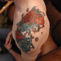 A koi fish tattoo is suitable for both men and women since the design is more inclined towards a sense of calm and peace. Coloured Koi Fish Tattoo On Shoulder Tattooimages Biz