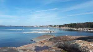 The deck structure of a ship serves as a lighthouse / beacon. Tallparkens Bad Av Peter Hogstrom Mostphotos