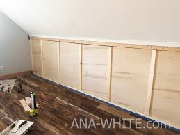Not every house has a knee wall, but if you've got this awkward space in your home then you can take advantage of it with this diy storage idea! Hidden Door Knee Wall Ana White