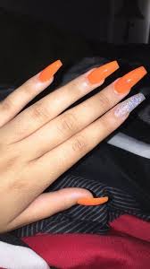 Since acrylic nails are a combination of liquid monomer and powder polymer when applied to your nails and exposed to the air, they form a hard using acrylics opens a door for experimenting with all kinds of manicures. Long Acrylic Long Acrylic Nails Orange Nails And Acrylic Nails Image 6783312 On Favim Com