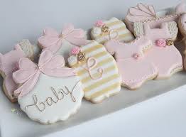 The first sunflower baby shower pink winter wonderland with silver snowflakes with a little snowflake is on her way sign. From Scratch Pink And Gold Princess Baby Shower Cake I Facebook