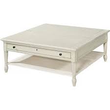 In one corner, you place a rustic teak cube near some seating for guests to cozy around. Beach Cottage Style Coffee Tables Shop The Styles Seas Your Day