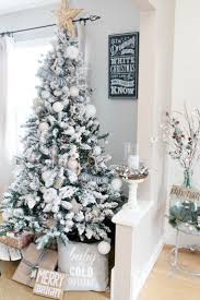 Farmhouse Dining Room Christmas Decorations Clean And Scentsible Flocked Christmas Trees Decorated Neutral Christmas Decor Christmas Tree Decorations