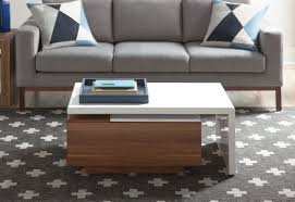 Made from solid and manufactured wood, the love the lift top table and the storage space. Effortless Minimalist Living Room Ideas Allmodern
