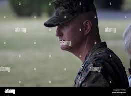 U.S. Marine Corps Col. Jeffery Tuggle, assistant chief of staff, 1st Marine  Division, speaks during a retirement ceremony for Master Gunnery Sgt. Bruce  Knapp, operations chief, 1st Marine Division, at Camp Pendleton,