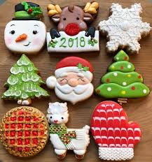 12 Decorated Holiday Sugar Cookies Holiday Cookies Santa Etsy In 2020 Santa Cookies Decorated Holiday Sugar Cookies Christmas Cookies Packaging