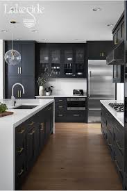 Black cabinets with an impressive island. Kitchen Storage Black Cabinets Kitchen Design Kitchen Design Small Kitchen Inspiration Design