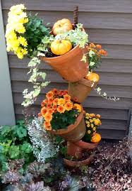 Fall Tilted Flower Pots With Images Flower Pots Fall Flowers Flowers