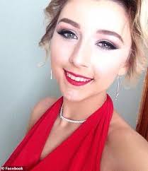 Mother hugs tearful daughter at vigil for the 10 victims who died in Irish  petrol station explosion