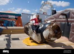 Mechanical bull ride hi-res stock photography and images - Alamy