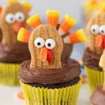 These thanksgiving cupcakes would be a great addition to the kids table at this year's thanksgiving celebration, topped with adorable pilgrim hats and cornucopia, they are sure to please the be sure to check out the cupcake heaven page, there are over 250 cupcake recipes and decorating ideas! Turkey Cupcakes Thanksgiving Cupcake Decorating Your Cup Of Cake