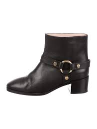 Black And Gold Motorcycle Boots Black Leather Stuart Weitzman Ankle Boots With Round Toes Gold Tone Hardware And Stacked Heels Leather Moto Boots Boots Black Leather Boots