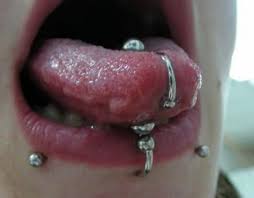 Tiny, petite little beads on the tip of your tongue, something new and. The Healing Process Of A Tongue Piercing With Pictures Tatring