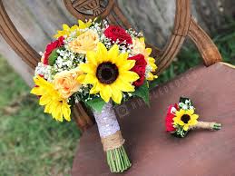 What's the best flower arrangement for a wedding? Red Rose Sunflower And Rose Bouquet Novocom Top