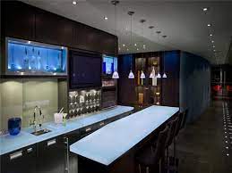 A glass counter top on a stainless steel bar and racing flag check board design on bar stools enhances. Top 40 Best Home Bar Designs And Ideas For Men Next Luxury