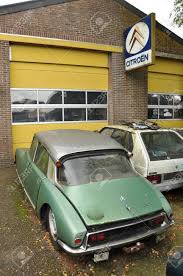 Our citroen specialist garage offers local garage services for people in the vicinity of: Oldtimer Citroen Ds In Front Of A Garage Citroen Dealership Stock Photo Picture And Royalty Free Image Image 27385309