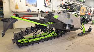 Ascender platform with narrower body panels for improved sidehilling capability. In Depth 2018 Arctic Cat M8000 Sno Pro Snowest Magazine