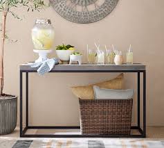 It provides for a cozy and relaxing environment in which you and your loved ones can get together and enjoy time with each other. Sloan Indoor Outdoor Concrete Iron Console Table Pottery Barn