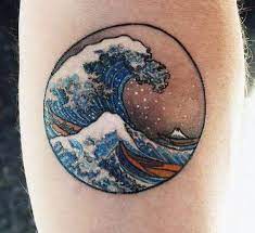 Japanese wave tattoos often symbolize strength and life through art. 90 Circle Tattoo Designs For Men Circular Ink Ideas Waves Tattoo Circle Tattoo Design Circular Tattoo