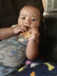 He is killing his Franks Pizza 🍕 not a tooth in the world but he knows at  an early age what he likes