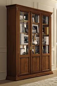 The number of shelves in a curio cabinet varies. Camel Treviso Day Cherry Wood Italian 3 Door Vetrine With Wooden Shelves Cfs Furniture Uk
