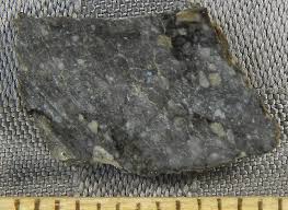 One of them has remnant fusion crust and very beautiful clast arrangement. Lunar Meteorite Dhofar 1673 1983 1984 Some Meteorite Information Washington University In St Louis